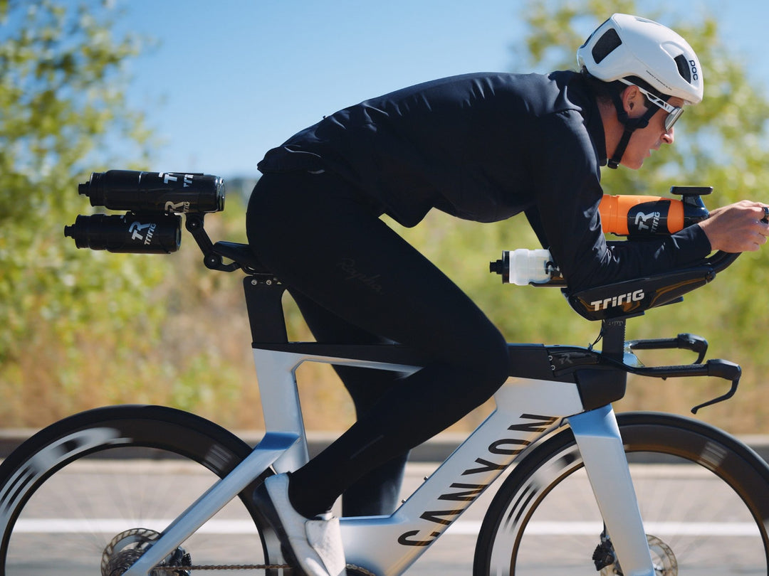 Rider in the aero position with bottles on the Beta System