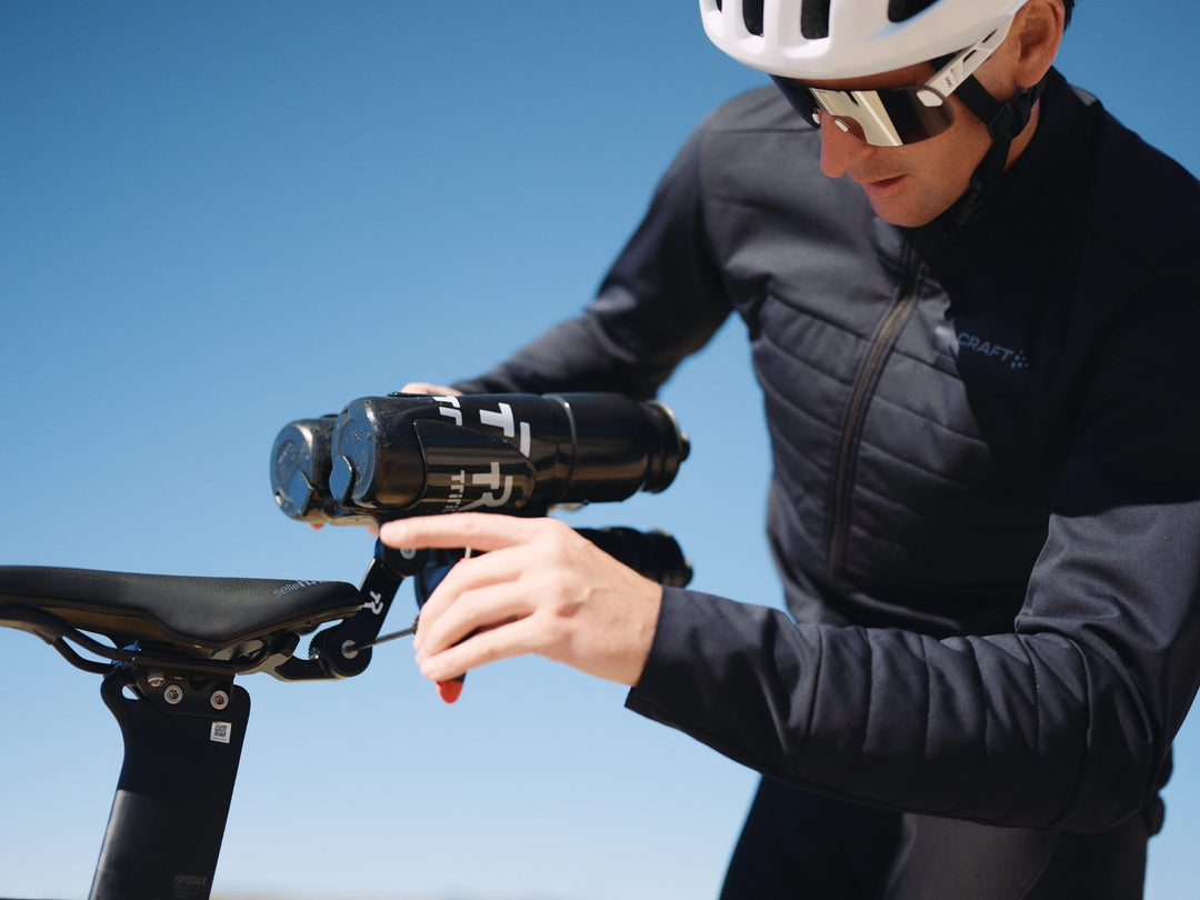 Rider adjusting a bottle on the Beta System